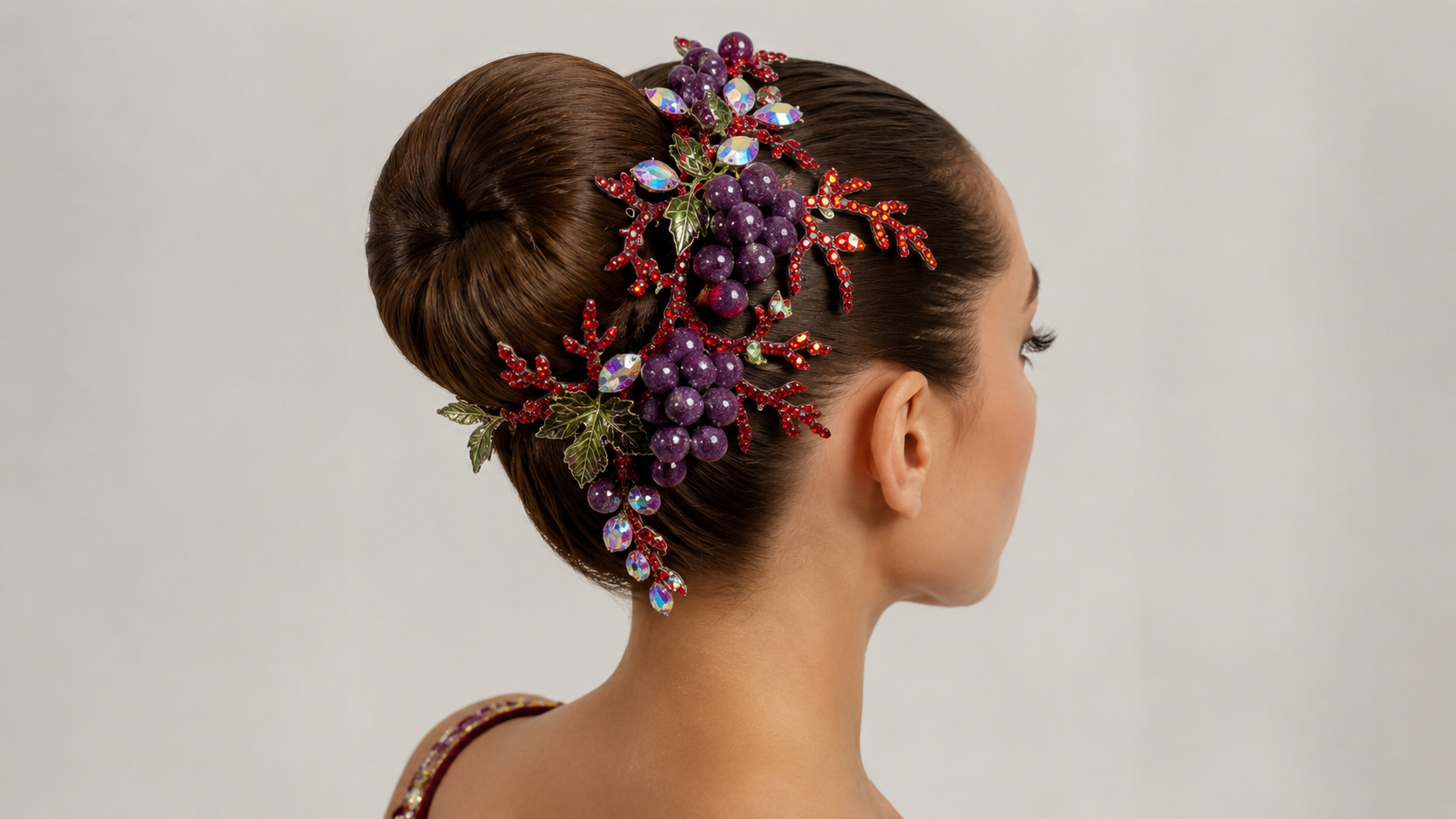 Crystal and beaded hairpiece styled into a performer's bun